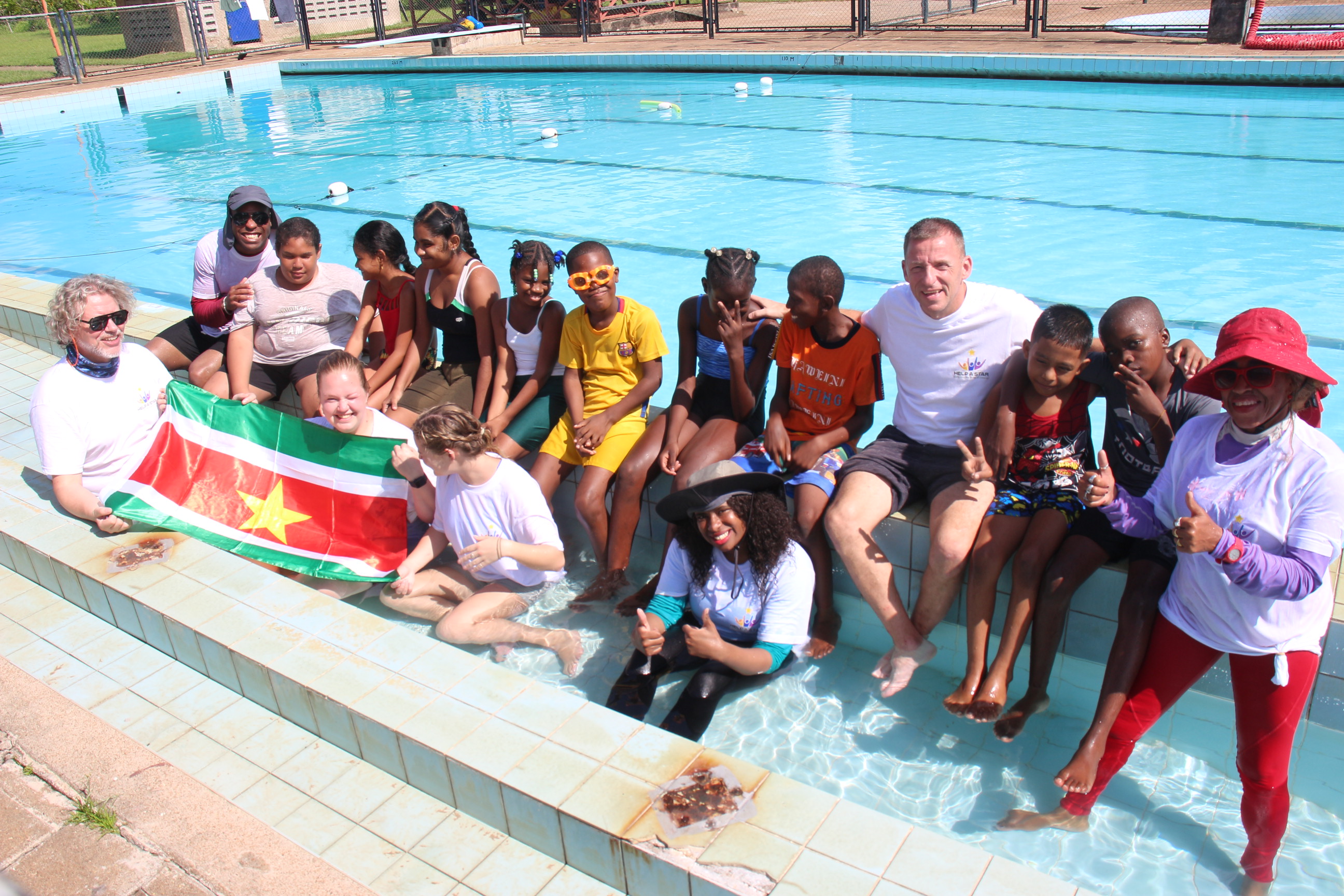 Children who participated with the survival skills training and Help a Star volunteers